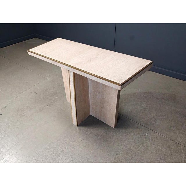 Elegant vintage travertine and brass console table . Beautiful timeless look. Good condition. 1970s- Italy Dimensions:...