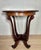 Elegant early 20th-century Art Nouveau side table crafted in solid oak with a beautifully sculptural pedestal base. The...