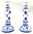 A lovely tall pair of vintage Delft style hand painted blue and white porcelain candlesticks from France. No maker's mark....