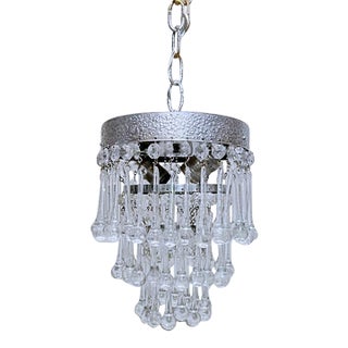 Vintage Crystal Upside Down Waterfall Chandelier With Ornate Silver-Tone Rim For Sale