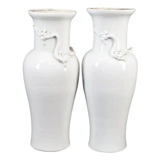 Pair of White Chinoiserie Vases With Dragon Motif For Sale
