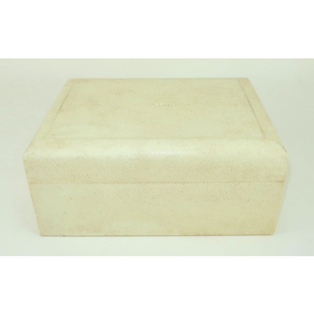 Late 20th Century Donna Karan ivory white shagreen wood lined covered box. The handsome rectangular 2 piece box measures...