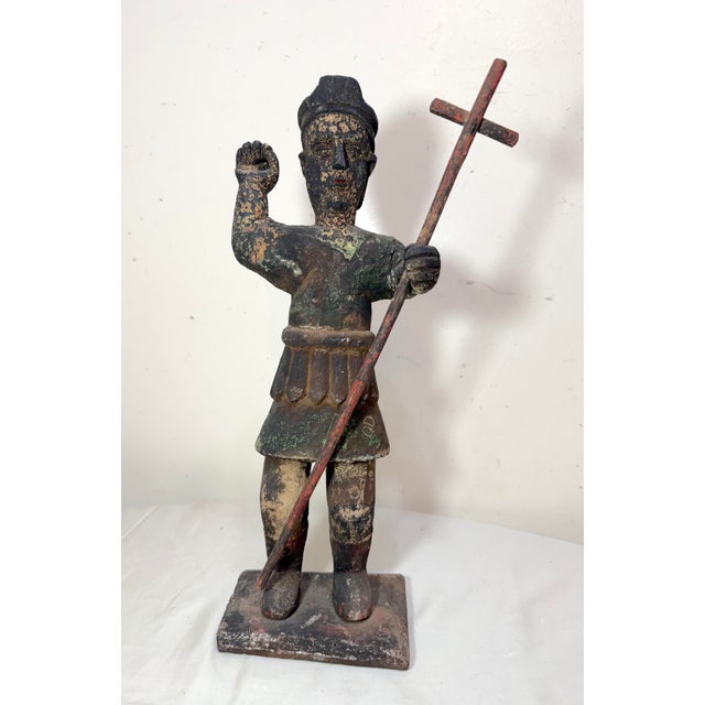 This large antique 17th century hand carved Archangel San Miguel religious Santos sculpture is a beautifully crafted piece...