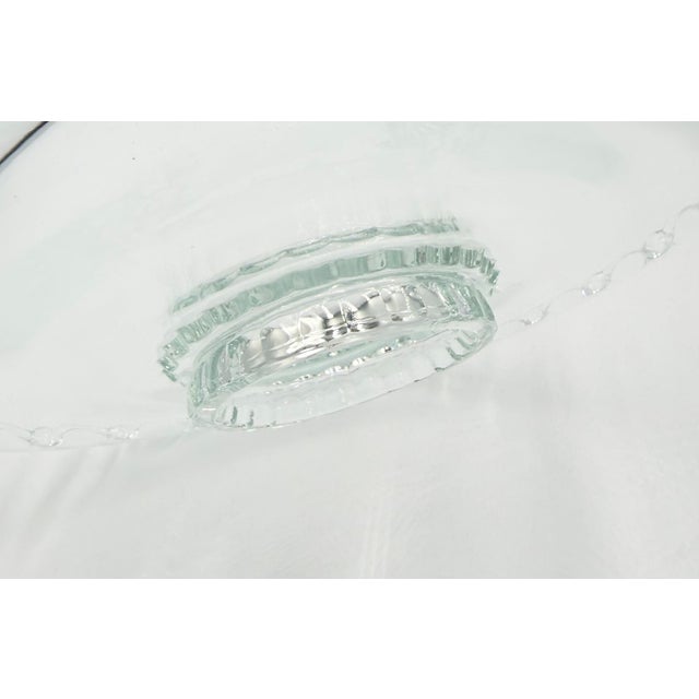 Timeless elegance of this exquisite vintage glass serving platter! This beautiful footed plate features a charming open...