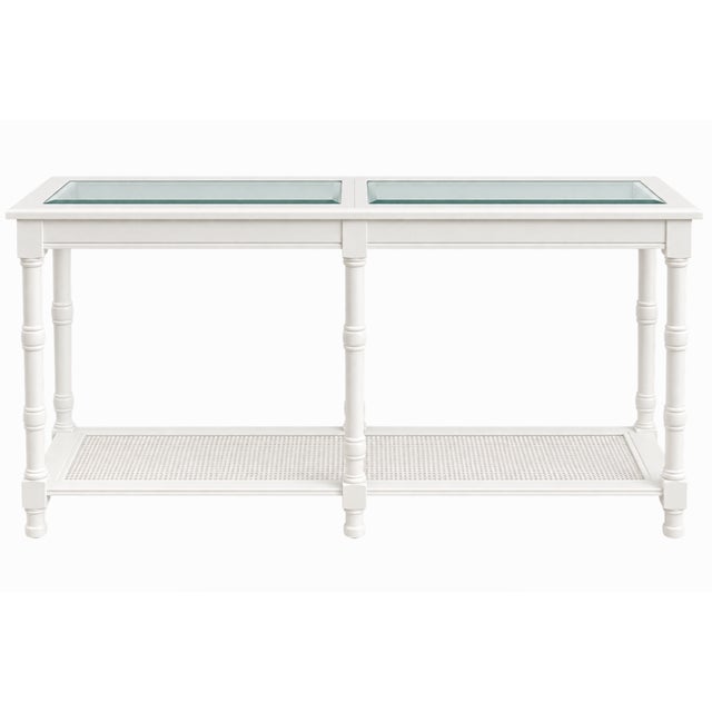 Elegant and versatile console table featuring a classic turned-leg design, crisp white finish, and beautiful architectural...