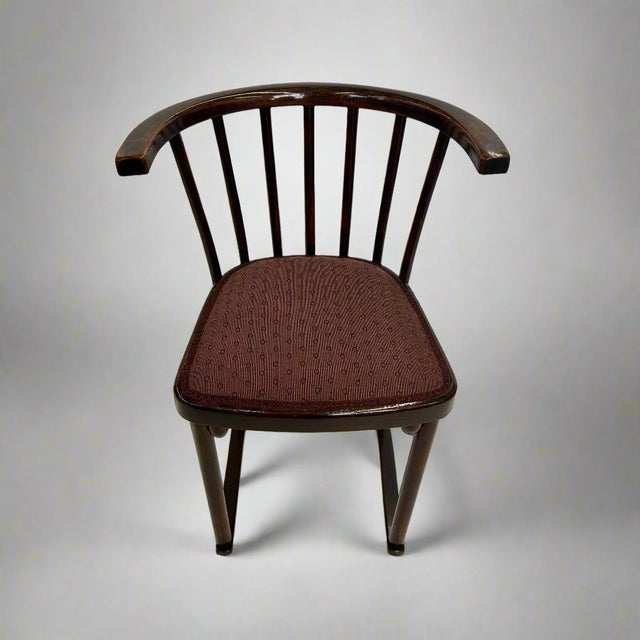 A pair of Thonet side chairs with original Thonet label. Stained beechwood.