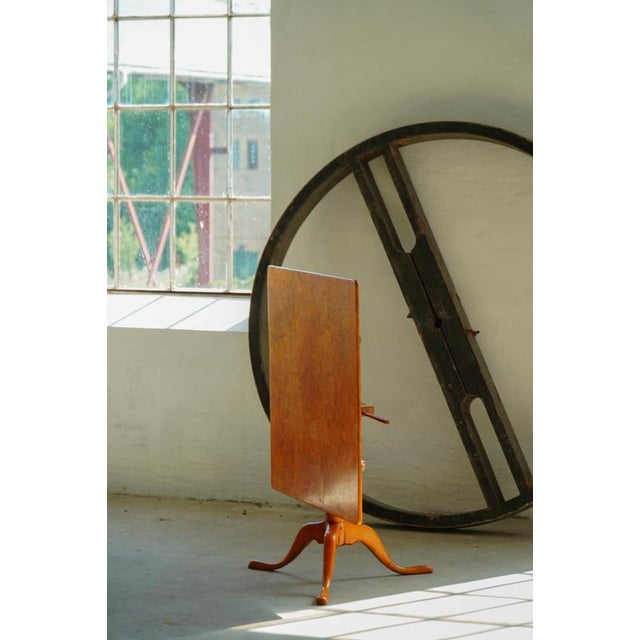 Elegant Swedish folding card table dating from the late 19th century, crafted in solid birch and beautifully veneered with...