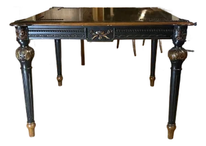 A Solid Hardwood Old Hickory Game Table Featuring a Western Motif, Highlighted by Nail Trim, Fluted Legs, and an Intricately Carved Apron