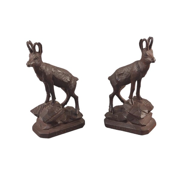 We are pleased to be offering this graceful pair of hand carved black forest Alpine Goats in good condition and great...