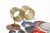 The objects pictured are vintage enamel coasters (or small plates) made of copper, arranged in a spiral metal stand. Such...