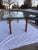 Asian Influenced Glass Dining Table in Faux Bamboo Having Bronze Fretwork For Sale - Image 11 of 12
