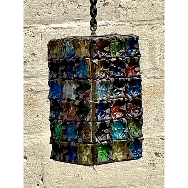 A true gem of mid-century Mexican design, this stunning vintage Brutalist hanging lamp After Felipe Delfinger for Feders...