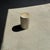 White petrified wood stool/side table inlaid with black. Petrified wood is a fossilized wood (same family as magnolia)...