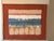 A striking original work on handmade paper by Claudia Adel Swager, titled Crypts at Khartoum and dated 1984. The...