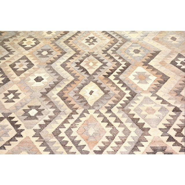 Flatweaved with care using traditional rug-making techniques, this wool rug blends timeless craftsmanship with a modern...