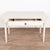 19th century Swedish desk or side table, crafted in pine. The table is raised on tapered legs topped by simple carved...