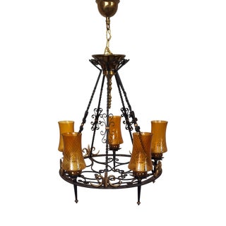 Vintage Rustic Chandelier in Wrought Iron, Brass, and Amber Glass Shades, 1970s For Sale