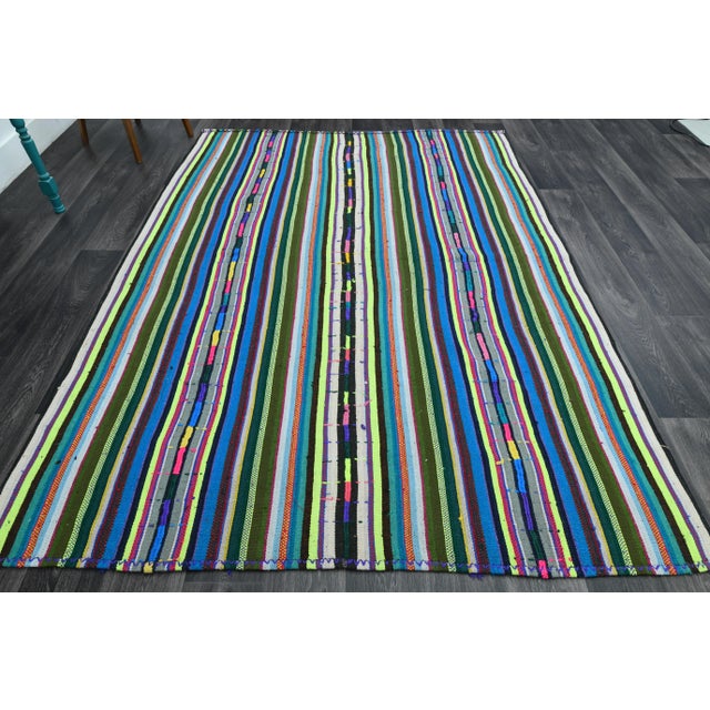 Vintage Turkish Hand-Knotted vintage rug is a semi-antique vintage area rug.'70s Eastern region of Turkey's unique rug is...