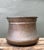 This exceptional 19th-century copper cauldron is a testament to the enduring beauty of hand-forged utilitarian art....