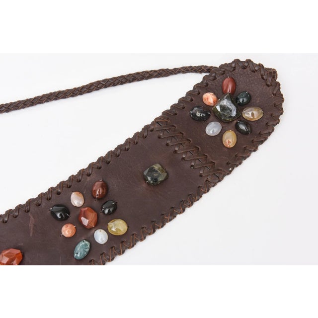 This gorgeous never used brown stitched leather tie belt has assorted cluster of beautiful agate stones in different...