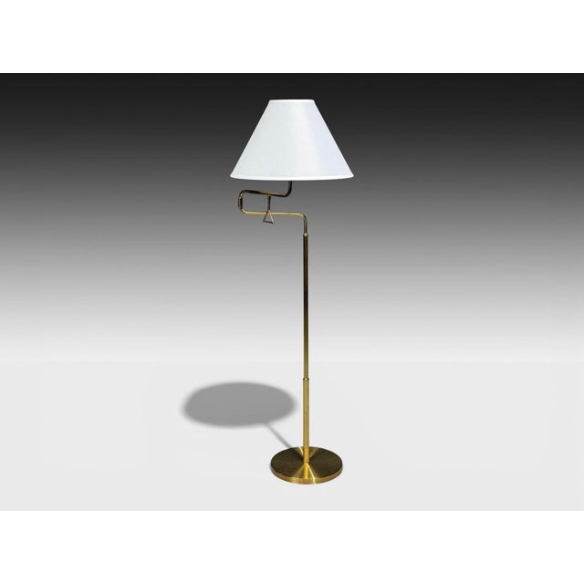 AB Armaturhantverk Göteborg, Swedish Mid-Century Modern, Articulating Floor Lamp, Brass, Fabric, Sweden, 1960s A brass...