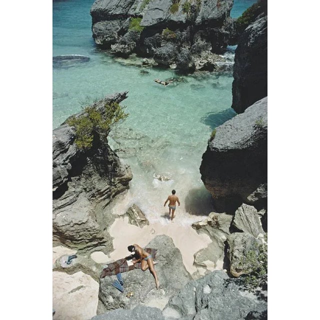 Holidaymakers in Bermuda 1967 Holidaymakers relaxing on a beach in Bermuda, 1967. Photo by Slim Aarons. Slim Aarons was...