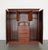 This late 19th century English compactum wardrobe by Ralph Johnson of Warrington is a beautifully crafted example of...