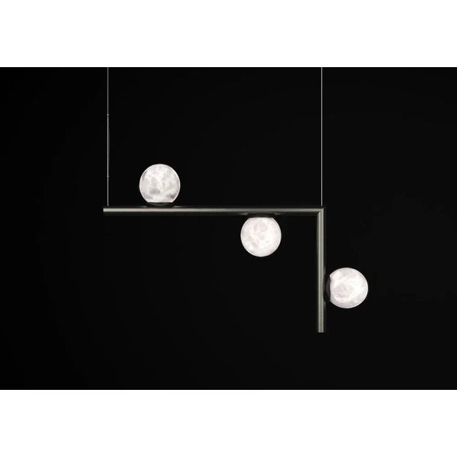 Ofione 2 brushed black metal pendant lamp by alabastro italiano dimensions: d 14 x w 85 x h 55 cm. Materials: white...