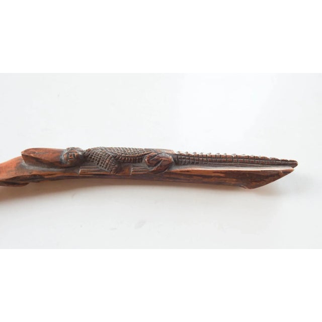 Circa 1920's hand carved wood letter opener with alligator. Carved Lookout Mt. on blade, few small nicks to blade.