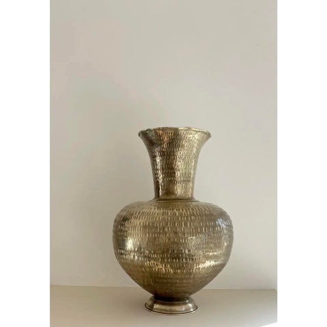 Vintage 14” tall hammered brass vase. Sculptural design, with narrow neck and wide body.