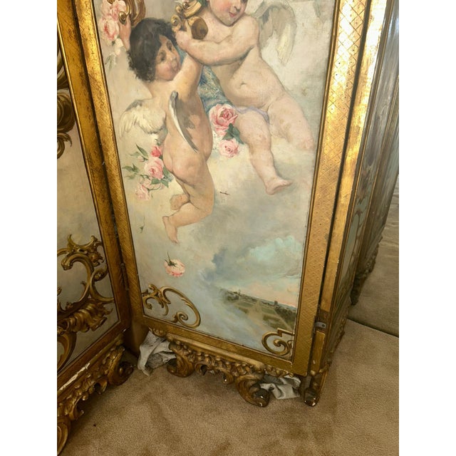 Rococo Antique French Rococo Gilded Three-Panel Hand-Painted Folding Screen With Cherubs and Floral Motifs For Sale - Image 3 of 10