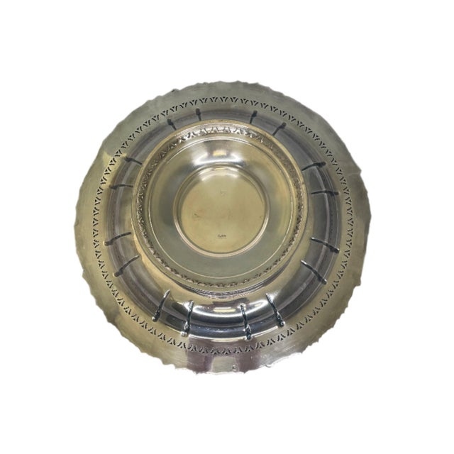 This Barker Ellis Menorah features a stamped silver plate bowl measuring 13 inches in top diameter, 6.5 inches at the...