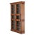 This tall pine cabinet blends European character with clean, timeless design. Featuring six glass-front doors and 14 fixed...