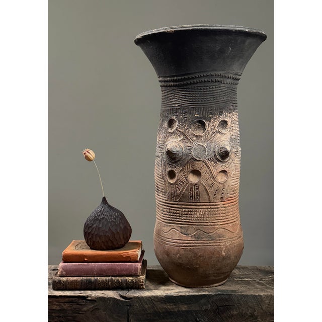 Antique Nupe Terracotta Pot Stand | Nigeria Dimensions: 22.25” H x 12” W x 12” D Origin: Nupe People, Nigeria Material:...