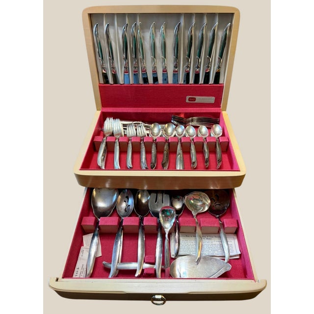 Exceptional 121-piece 1847 Rogers Bros. silverplate flatware set in the Flair pattern, introduced by International Silver...