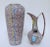 Two mid-century Scheurich ceramic vases in matching mottled glazes with hand-painted atomic age-style decoration. Both...