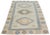 Vintage Hand-knotted with care using traditional rug-making techniques, this wool rug blends timeless craftsmanship with a...