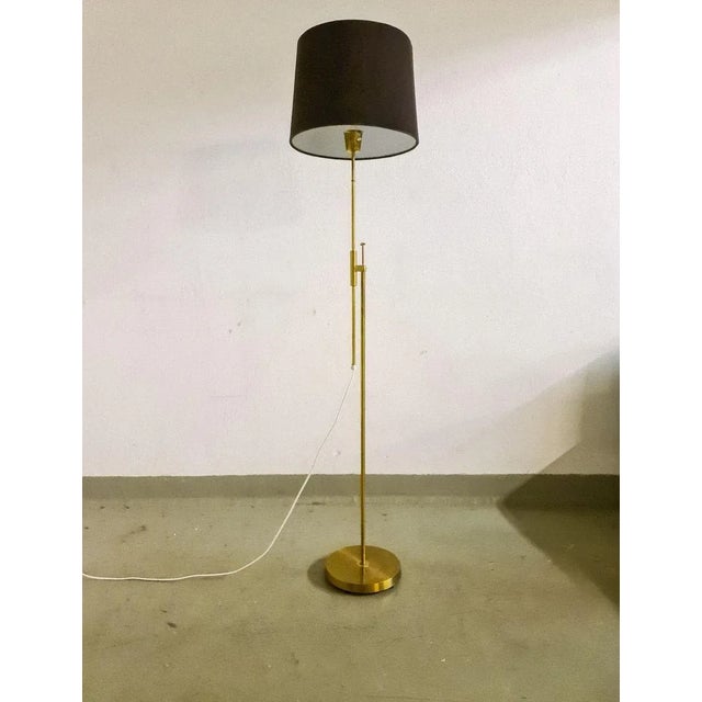 This lamp was made in sweden at falkenbergs belysning. Wonderful assembled brass combination with adjustable height. Good...