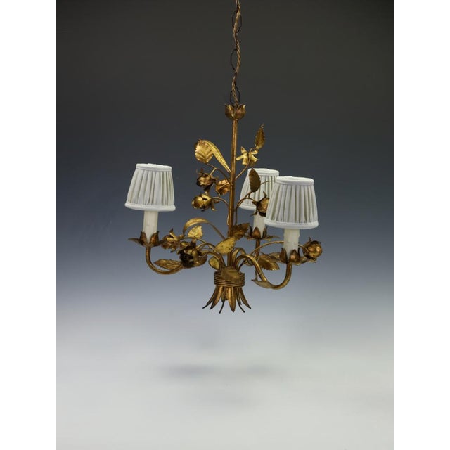 Hans Kögl Hollywood Regency Gilt Rose & Wheat Five-Arm Chandelier, 1970s, in Very Good conditions. Designed 1970 to 1979...