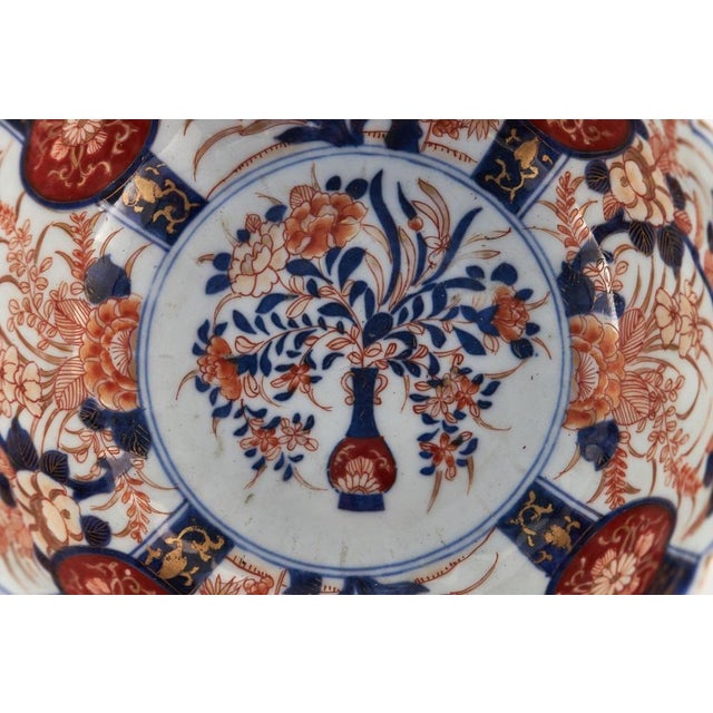 Early 20th Century antique Japanese Imari bowl having wonderful hand painted red, blue, orange, white and gold colours...