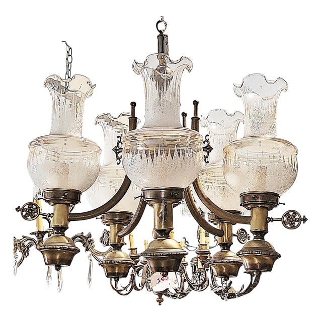 Turn back time with this 1950-60s Victorian style chandelier in antique brass and etched champagne hue glass globes, 5...