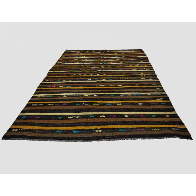 Striped vintage Kilim rug from Afyon region of Turkey. Approximately 50-60 years old. In very good condition