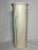 Vintage Haeger tall column vase with a relief pattern of layered foliage leaves that changes around the vase.. 19.75”...