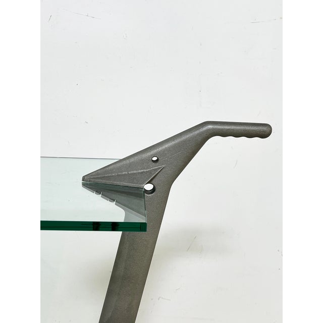 A postmodern drinks trolley by the Milanese designer Franco Raggi for Fontana Arte, circa 1980s.