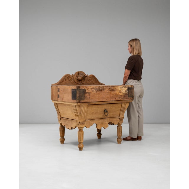 Carved oak marble-top commode in Weathered Honey Oak. Finished in weathered honey oak, this carved oak marble-top commode...