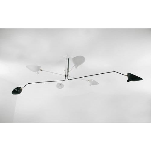 Ceiling lamp model 'six rotating arms ceiling lamp' designed by serge mouille in 1958. Manufactured by editions serge...