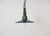 Industrial blue enamel pendant light made in Poland during the 1960s. White enamel inside the shade. Green cast aluminium...
