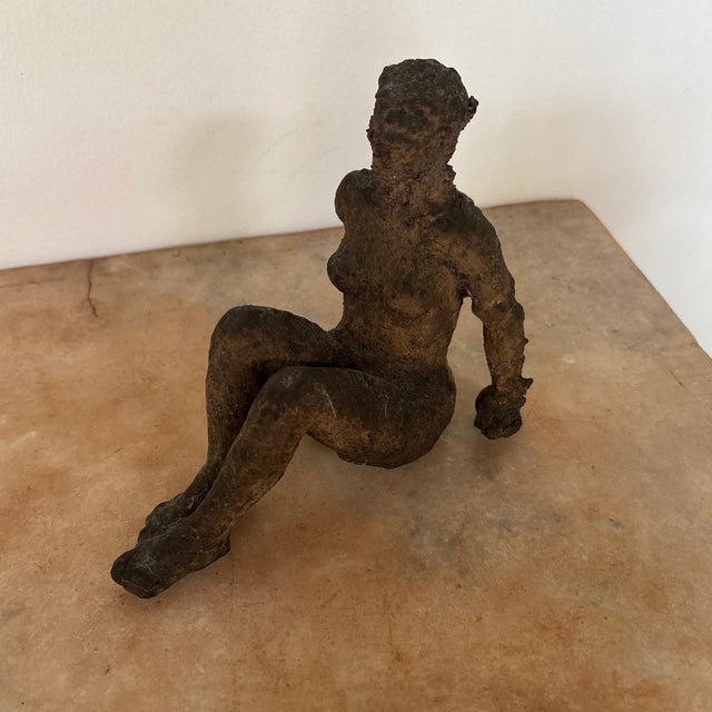 This sculpture was purchased over 10 years ago from an antique dealer in Iowa city Iowa. It apparently has sat in the...