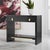 Black Nightstand with polished brass hardware showcases the distinctive texture of black lacewood veneer that is enhanced...