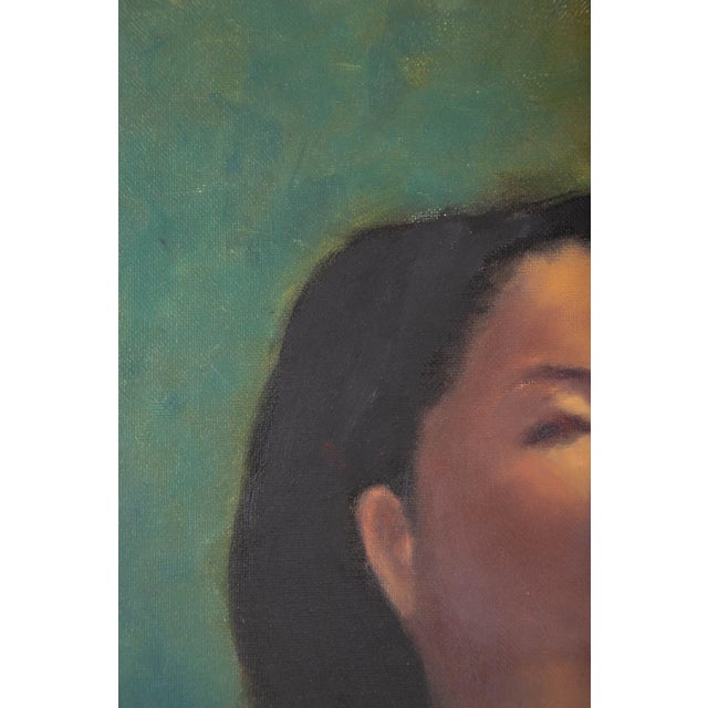 Original Oil Painting – Woman in Blue Lovely oil painting featuring a serene portrait of an Asian woman, primarily shades...